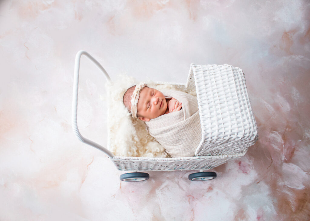 Baby Girl in white cane basket pram Tweed NSW Photography
